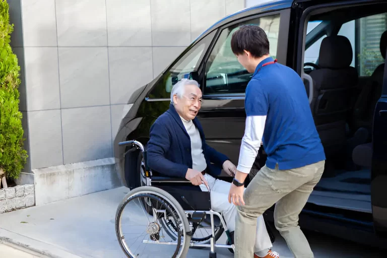 Senior passenger boarding On Time NEMT wheelchair accessible van — elderly transportation Hampton Roads Virginia